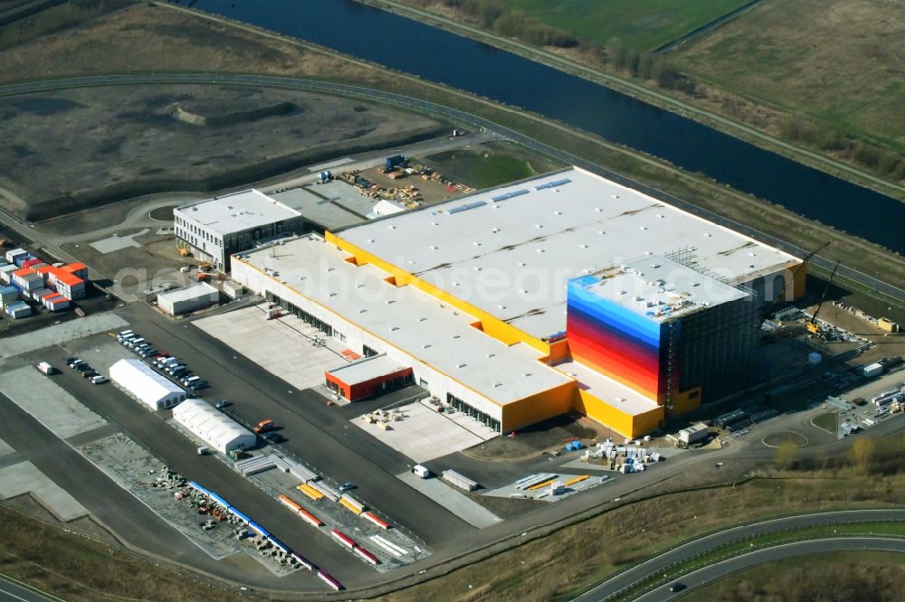 Wustermark from above - Construction site and assembly work for the construction of a high-bay warehouse building complex and logistics center on the premises dm VZ Verteilerzentrum in Wustermark in the state Brandenburg, Germany