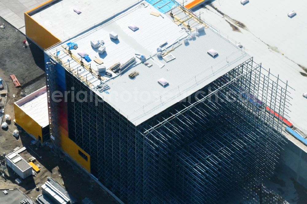 Wustermark from above - Construction site and assembly work for the construction of a high-bay warehouse building complex and logistics center on the premises dm VZ Verteilerzentrum in Wustermark in the state Brandenburg, Germany