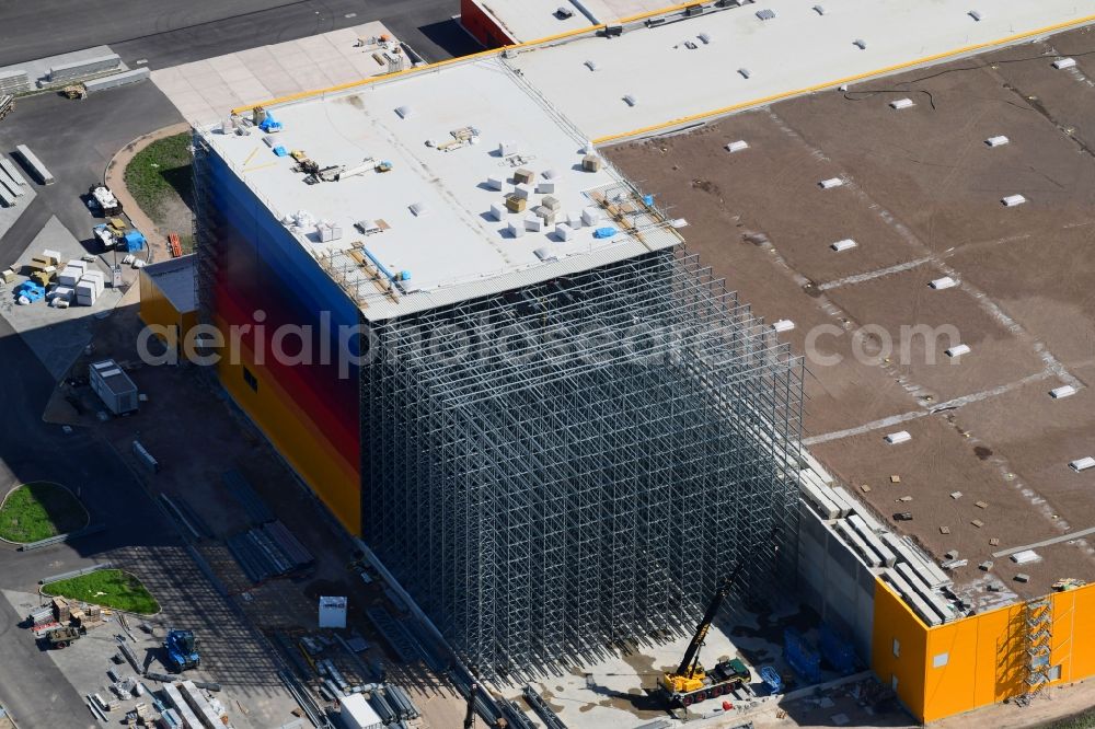 Wustermark from above - Construction site and assembly work for the construction of a high-bay warehouse building complex and logistics center on the premises dm VZ Verteilerzentrum in Wustermark in the state Brandenburg, Germany