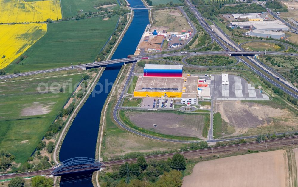 Wustermark from above - Construction site and assembly work for the construction of a high-bay warehouse building complex and logistics center on the premises dm VZ Verteilerzentrum in Wustermark in the state Brandenburg, Germany