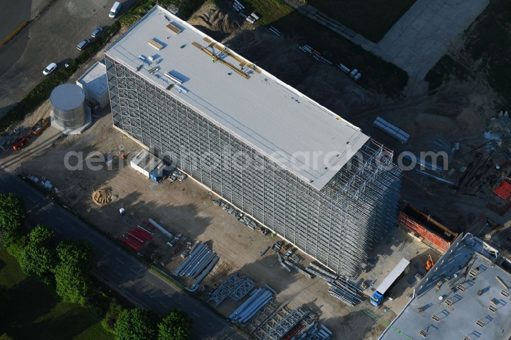 Uelzen from above - Construction site and assembly work for the construction of a high-bay warehouse building complex and logistics center in Uelzen in the state Lower Saxony, Germany