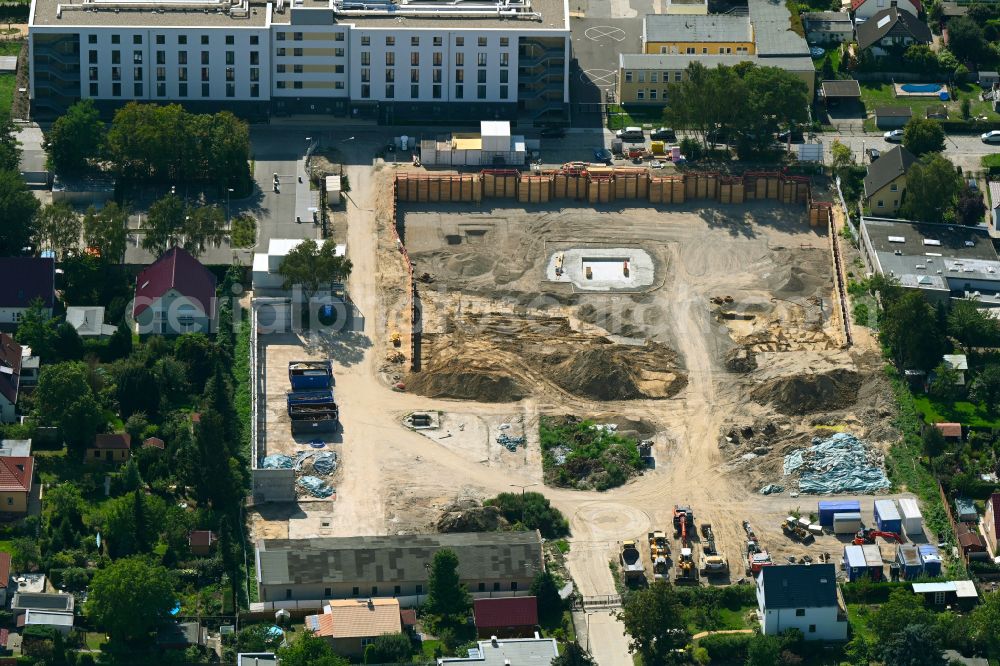 Aerial image Berlin - Construction site to build a new multi-family residential complex on street Muensterberger Weg in the district Kaulsdorf in Berlin, Germany