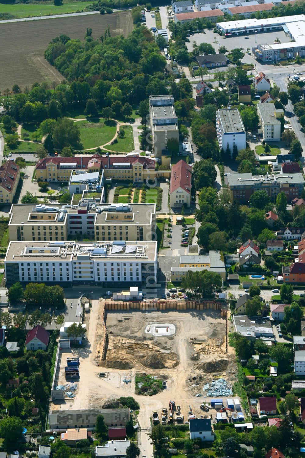 Aerial photograph Berlin - Construction site to build a new multi-family residential complex on street Muensterberger Weg in the district Kaulsdorf in Berlin, Germany