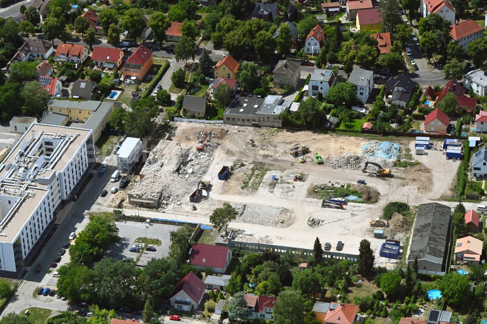 Berlin from above - Construction site to build a new multi-family residential complex on street Muensterberger Weg in the district Kaulsdorf in Berlin, Germany