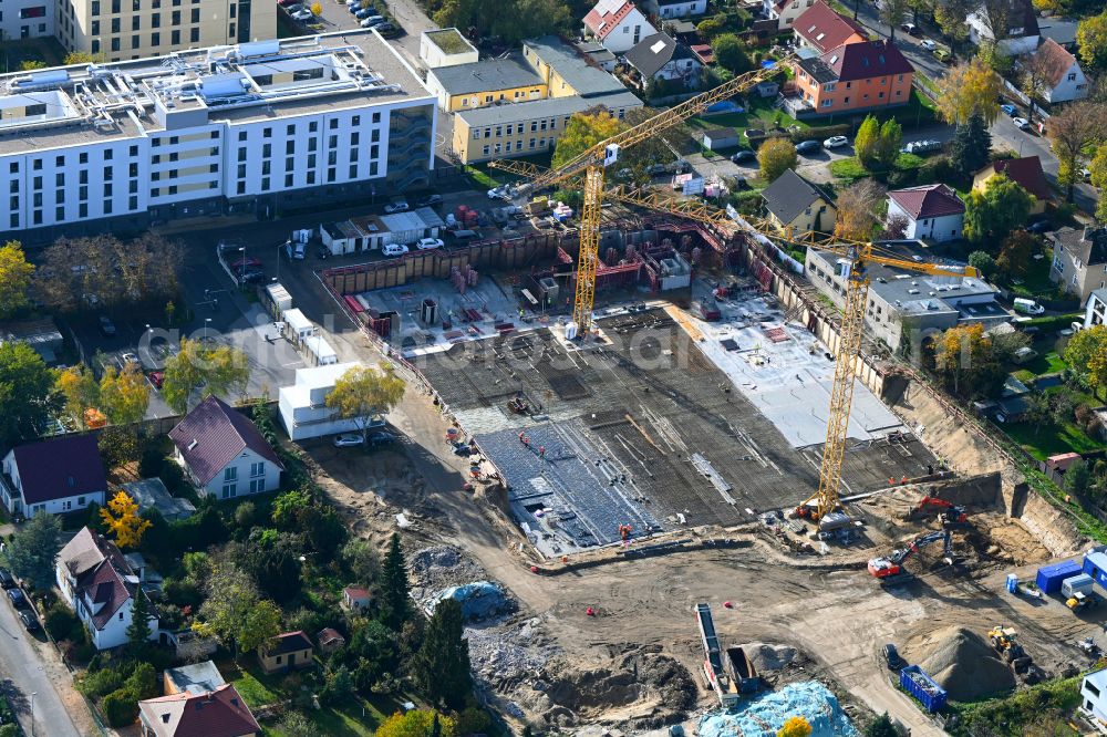 Berlin from the bird's eye view: Construction site to build a new multi-family residential complex on street Muensterberger Weg in the district Kaulsdorf in Berlin, Germany