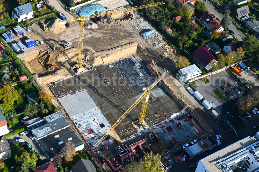 Berlin from above - Construction site to build a new multi-family residential complex on street Muensterberger Weg in the district Kaulsdorf in Berlin, Germany