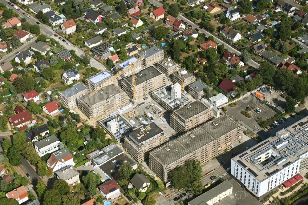 Berlin from the bird's eye view: Construction site to build a new multi-family residential complex on street Muensterberger Weg in the district Kaulsdorf in Berlin, Germany