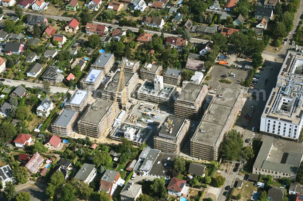 Aerial image Berlin - Construction site to build a new multi-family residential complex on street Muensterberger Weg in the district Kaulsdorf in Berlin, Germany