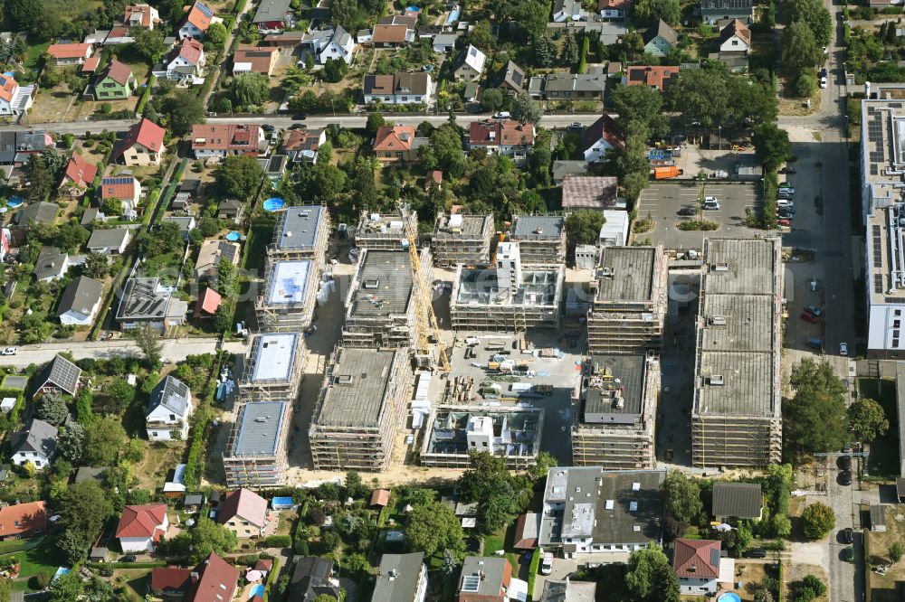 Aerial photograph Berlin - Construction site to build a new multi-family residential complex on street Muensterberger Weg in the district Kaulsdorf in Berlin, Germany