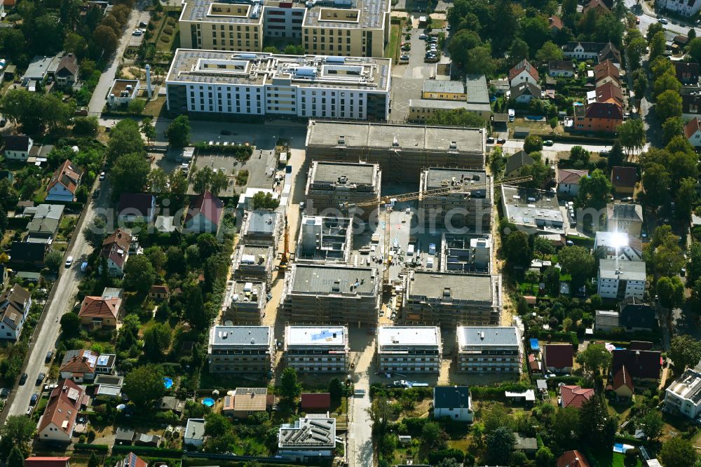 Aerial image Berlin - Construction site to build a new multi-family residential complex on street Muensterberger Weg in the district Kaulsdorf in Berlin, Germany