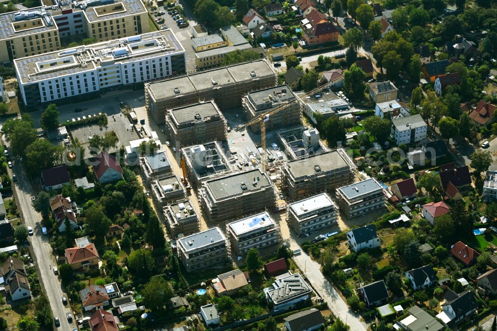 Aerial photograph Berlin - Construction site to build a new multi-family residential complex on street Muensterberger Weg in the district Kaulsdorf in Berlin, Germany