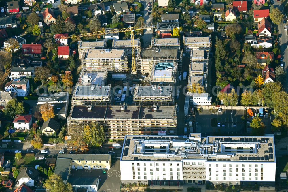 Berlin from the bird's eye view: Construction site to build a new multi-family residential complex on street Muensterberger Weg in the district Kaulsdorf in Berlin, Germany