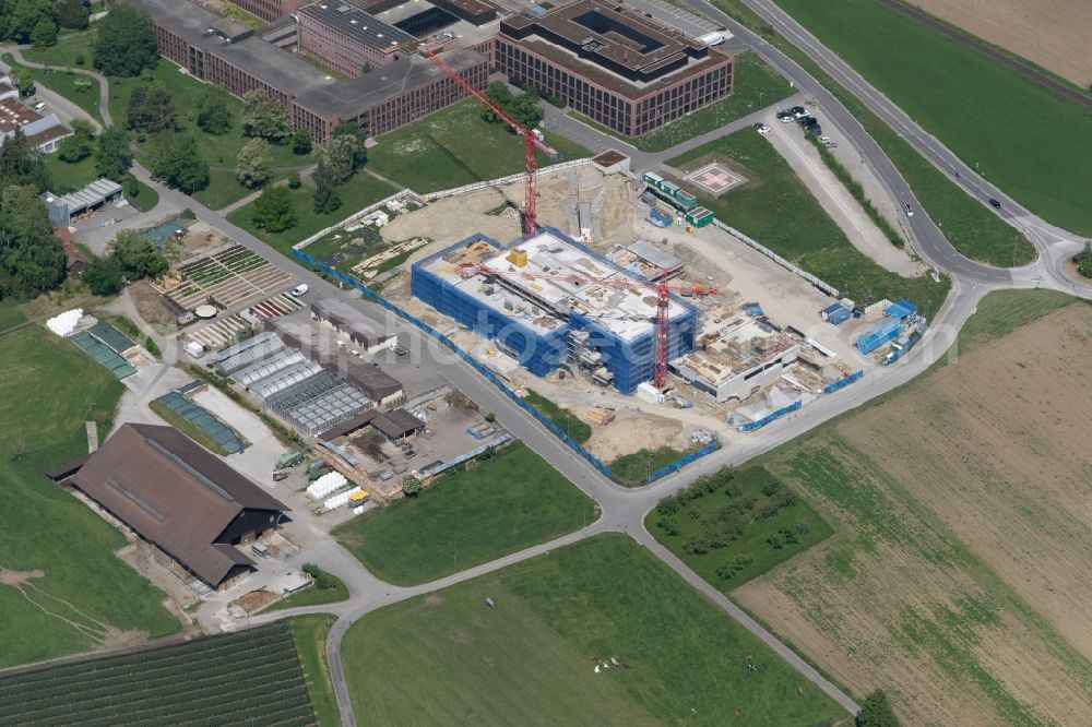 Münsterlingen from above - New construction site for a medical center and hospital clinic of Klinik Muensterlingen in Muensterlingen in the canton Thurgau, Switzerland