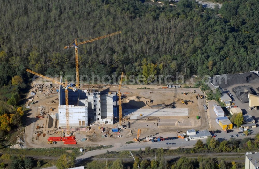 Rüdersdorf from the bird's eye view: Construction site of Power plants and exhaust towers of Waste incineration plant station IKW Ruedersdorf on Siedlerweg in Ruedersdorf in the state Brandenburg, Germany