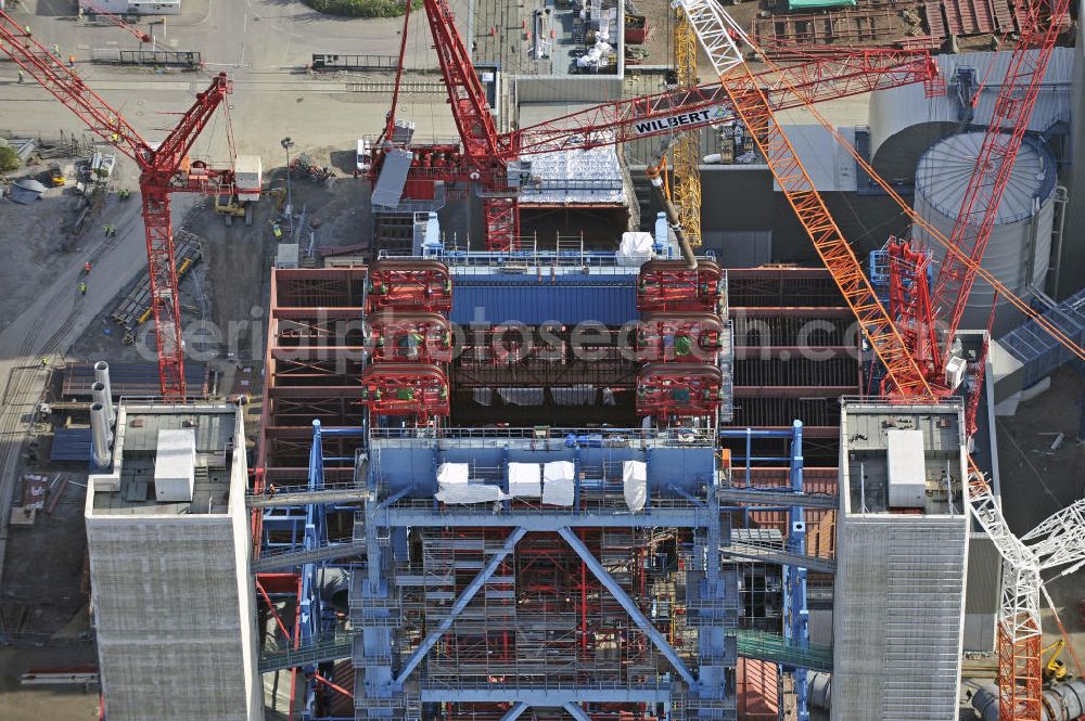 Aerial photograph Karlsruhe - Neubau des steinkohlebefeuerten Kraftwerksblock 8 (RDK-8) des Rheinhafen-Dampfkraftwerks bei Karlsruhe. Die Inbetriebnahme des Blocks ist für das Frühjahr 2012 vorgesehen. Betreiber des Kraftwerks ist die Energie Baden-Württemberg Kraftwerke AG (EnBW). Construction of the coal-fired power plant unit 8 (RDK-8) of the steam power plant at the Rhine port.