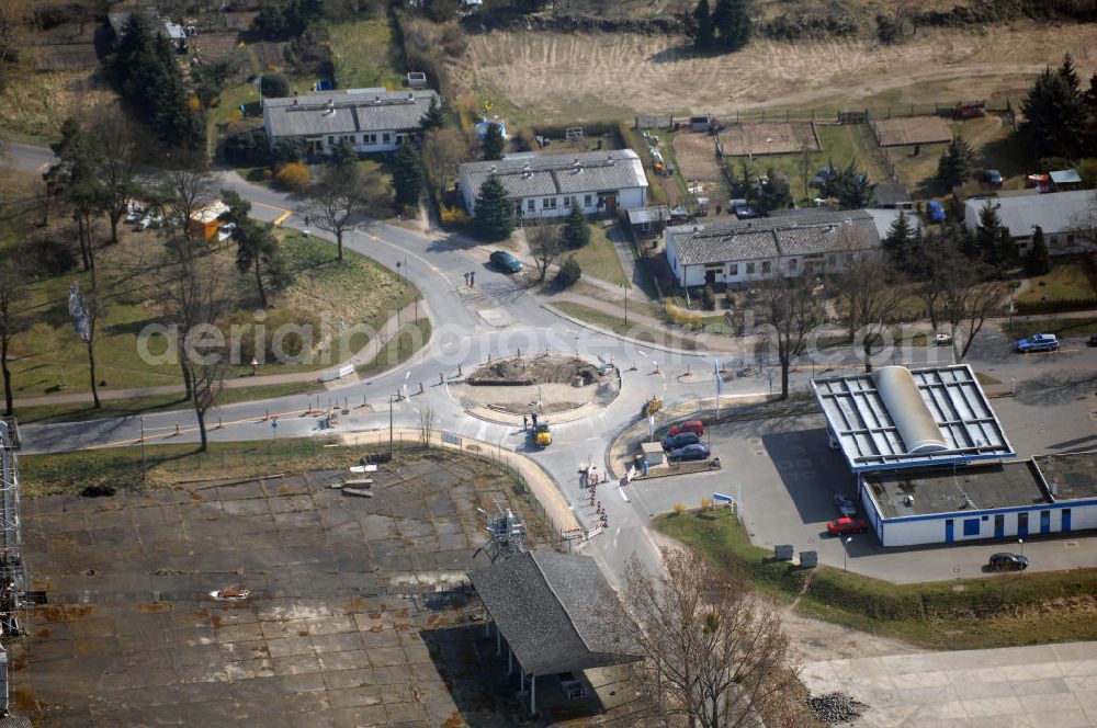 Werneuchen from above - Blick auf den Neubau des Kreisverkehr an der Kreuzung Freienwalder Chaussee (B158) / Alte Hirschfelder Straße in Werneuchen. Der erst vor wenigen Jahren im Zuge des Neubaues der B158 erbaute Kreisverkehr wird zur Zeit erneut umgebaut, damit er künftig von Groß- und Schwerlasttransporten besser befahren werden kann. Ende April sollen die Arbeiten abgeschlossen sein. Ausführende Baufirmen: BERGER BAU GmbH und Schüßler-Plan Ingenieurgesellschaft mbH