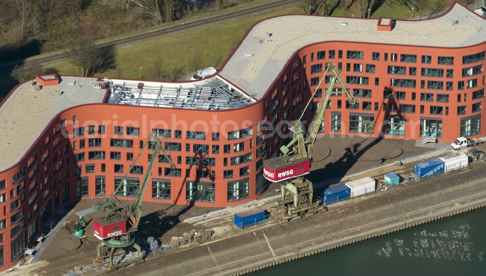 Aerial image Duisburg - View of the NRW State Archives building on a former wharf site of the Duisburg inner harbor. Hochtief Construction AG NRW built here designed by the architects Ortner & Ortner architecture a 160m long shaft with a 76m high tower archives