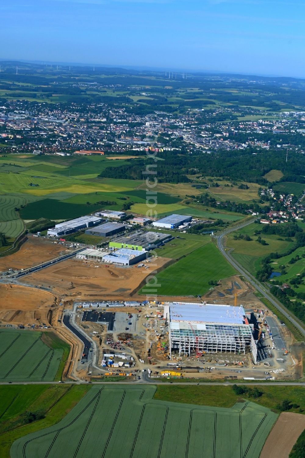 Hof from the bird's eye view: Construction site to build a new building complex on the site of the logistics center Amazon Warenlager in Gewerbepark Hochfranken in the district Gumpertsreuth in Hof in the state Bavaria, Germany