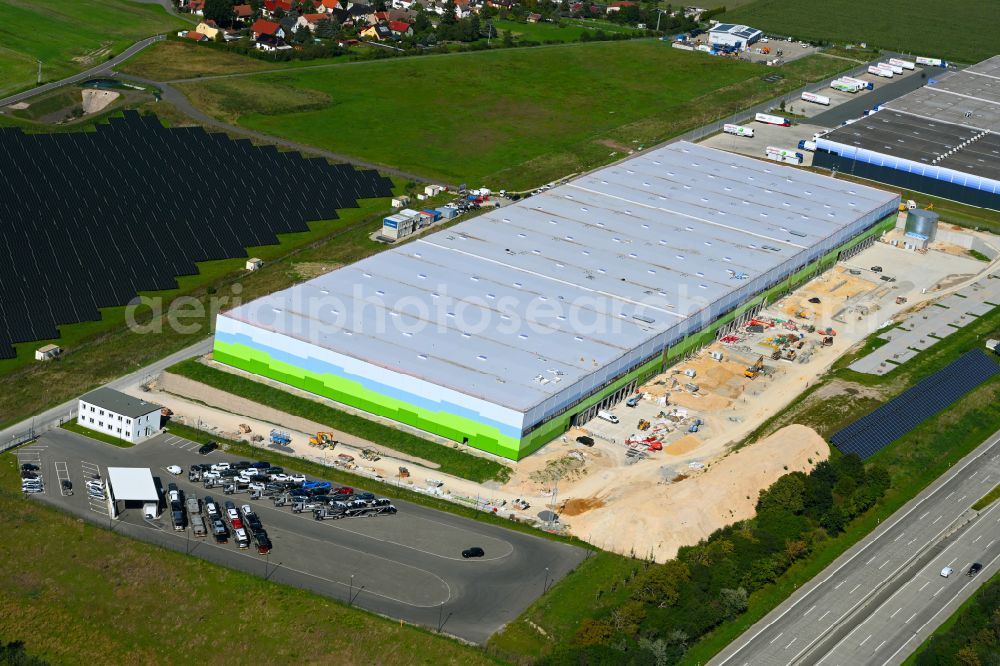 Bollberg from above - Construction site to build a new building complex on the site of the logistics center on street Im Gewerbepark in Bollberg in the state Thuringia, Germany