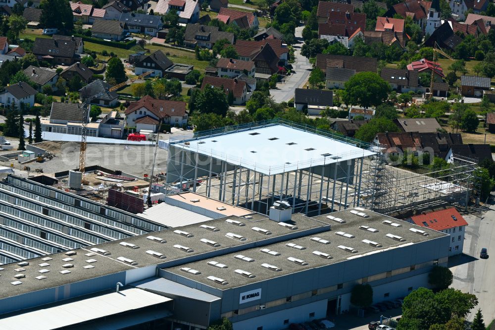 Schopfloch from above - Construction site to build a new building complex on the site of the logistics center and Buerogebaeude on Firmengelaende of HOMAG GmbH on street Am Roedelsberg in Schopfloch in the state Baden-Wuerttemberg, Germany