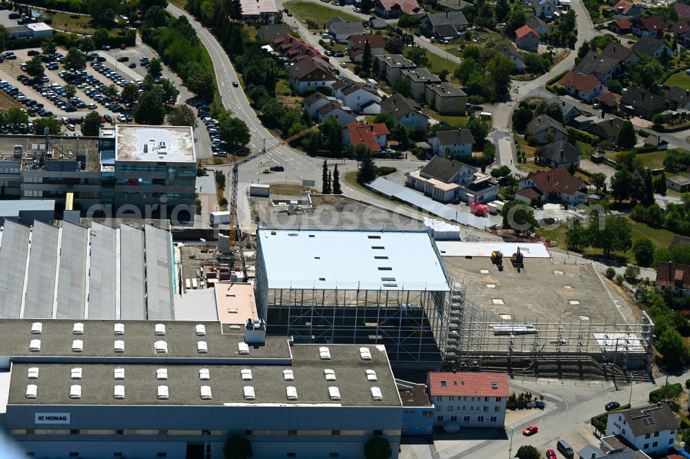 Schopfloch from the bird's eye view: Construction site to build a new building complex on the site of the logistics center and Buerogebaeude on Firmengelaende of HOMAG GmbH on street Am Roedelsberg in Schopfloch in the state Baden-Wuerttemberg, Germany