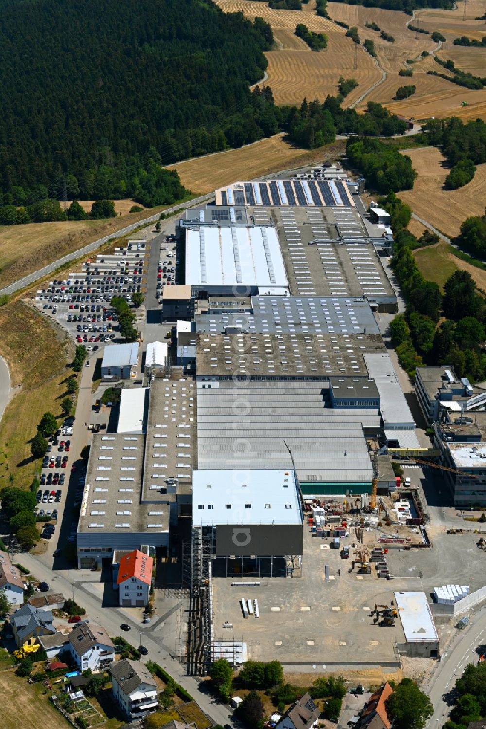 Aerial photograph Schopfloch - Construction site to build a new building complex on the site of the logistics center and Buerogebaeude on Firmengelaende of HOMAG GmbH on street Am Roedelsberg in Schopfloch in the state Baden-Wuerttemberg, Germany