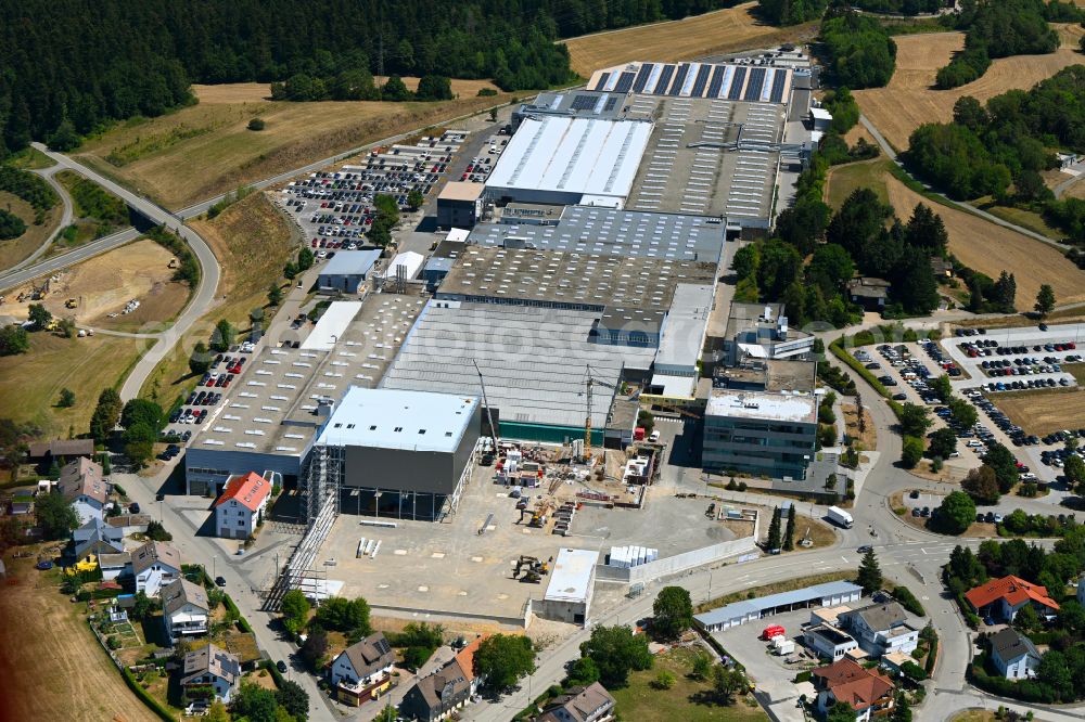 Schopfloch from above - Construction site to build a new building complex on the site of the logistics center and Buerogebaeude on Firmengelaende of HOMAG GmbH on street Am Roedelsberg in Schopfloch in the state Baden-Wuerttemberg, Germany