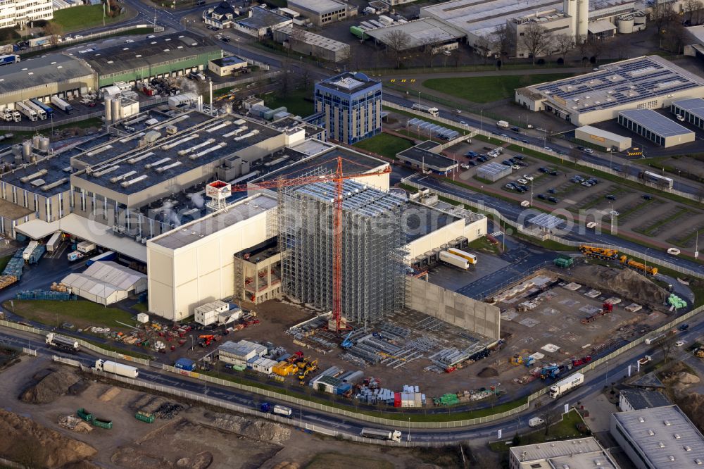 Moers from the bird's eye view: Construction site for the new building complex on the site of the logistics center Moers Frischeprodukte GmbH & Co.KG on Dr.-Berns-Strasse in Moers in the state of North Rhine Westphalia, Germany