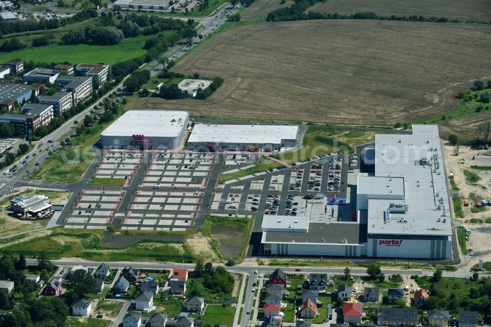 Aerial image Berlin - Construction site for the new building home-center of the Porta-Group at Pilgramer street in the district Mahlsdorf in Berlin