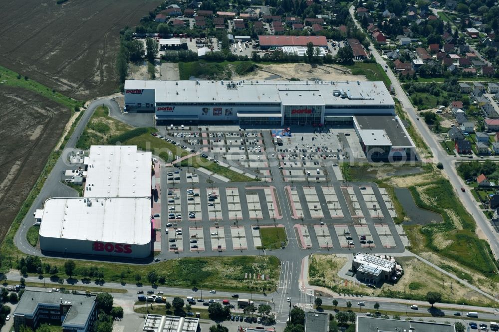 Berlin from above - Construction site for the new building home-center of the Porta-Group at Pilgramer street in the district Mahlsdorf in Berlin