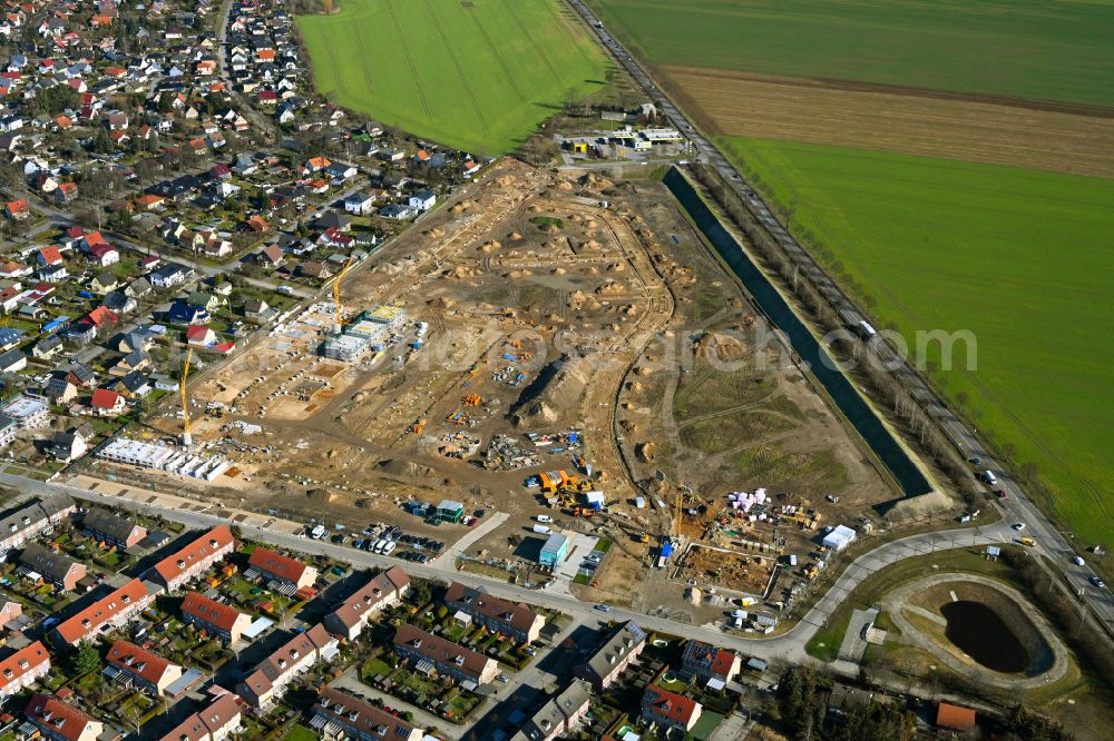 Ahrensfelde from above - Construction site to build a new multi-family residential complex Ahrensfelder Obstwiesen on street Blumberger Chaussee in Ahrensfelde in the state Brandenburg, Germany