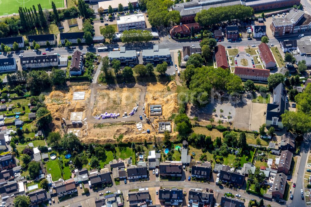 Bottrop from the bird's eye view: Construction site to build a new multi-family residential complex on street Reckmannallee in Bottrop at Ruhrgebiet in the state North Rhine-Westphalia, Germany