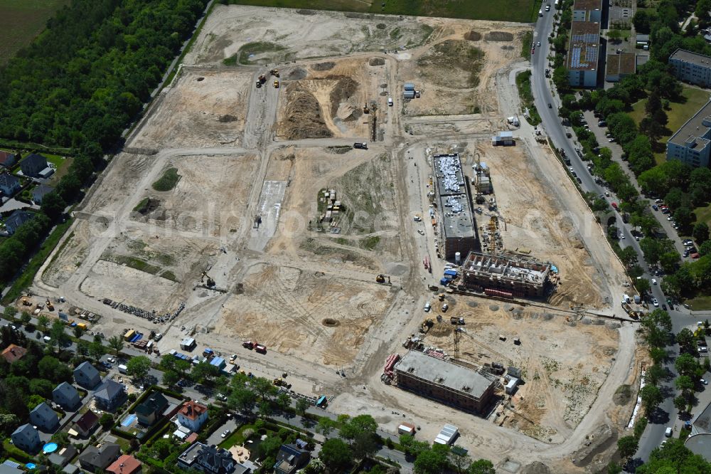 Berlin from above - Construction site to build a new multi-family residential complex Buckower Felder on street Gerlinger Strasse in the district Buckow in Berlin, Germany