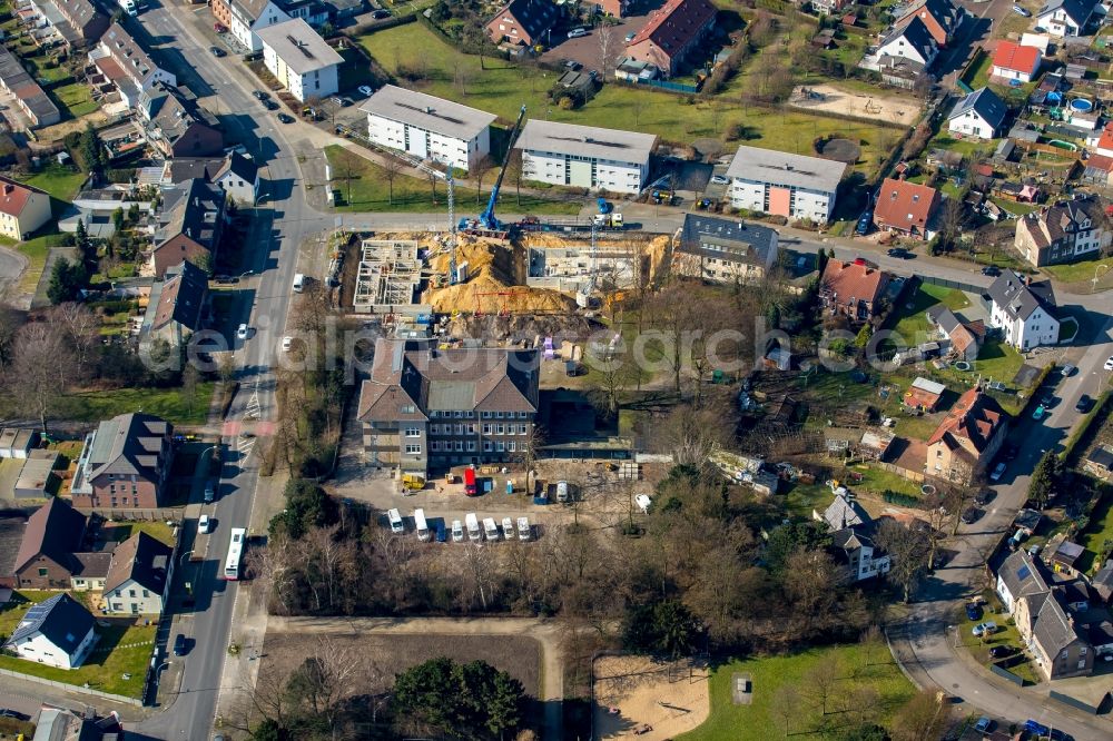 Bottrop from above - Construction site to build a new multi-family residential complex at the Tannenstrasse and Trappenstrasse, which will initially be used as a refugee accommodation in Bottrop in the state North Rhine-Westphalia