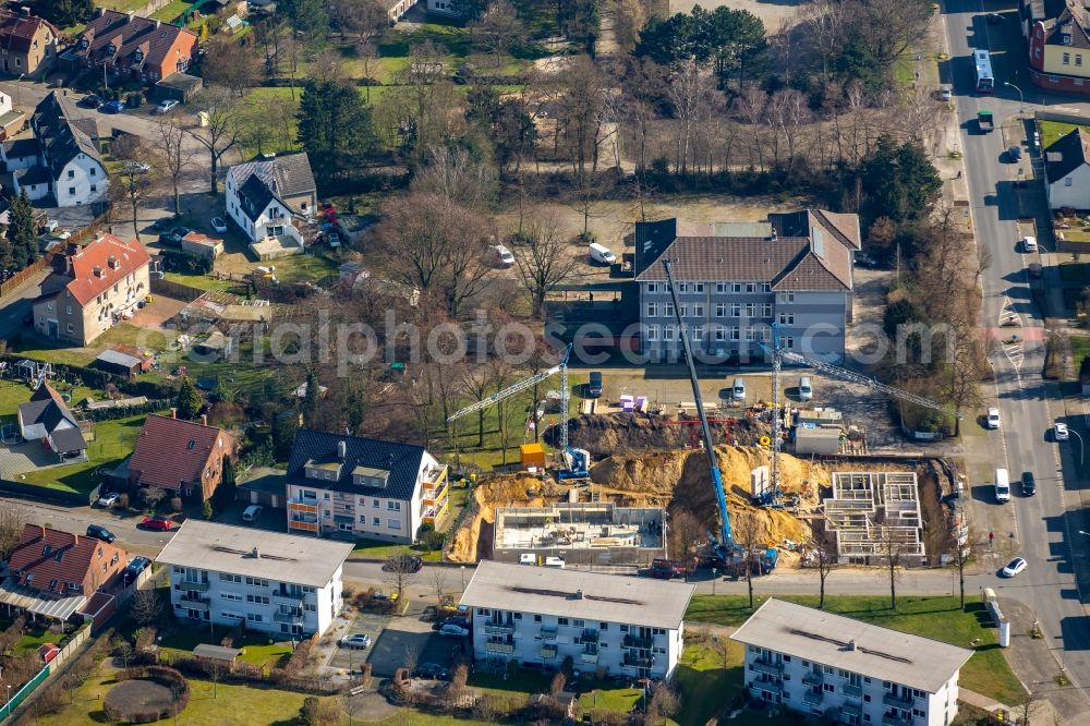 Aerial image Bottrop - Construction site to build a new multi-family residential complex at the Tannenstrasse and Trappenstrasse, which will initially be used as a refugee accommodation in Bottrop in the state North Rhine-Westphalia