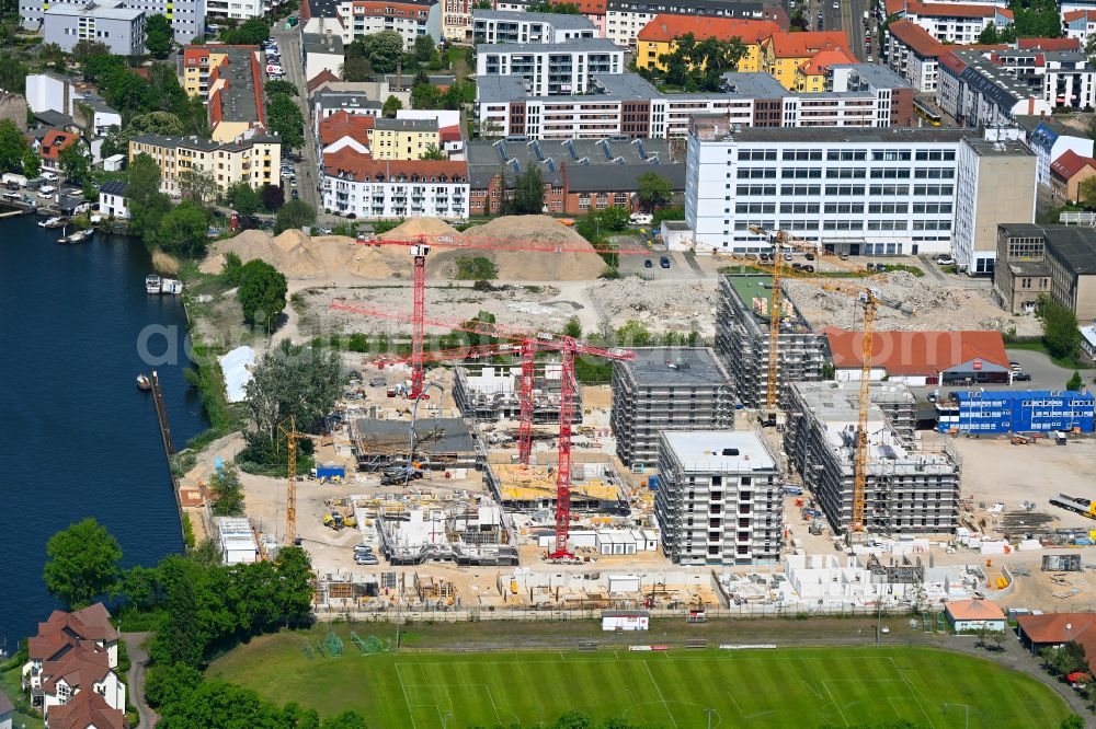 Berlin from above - Construction site to build a new multi-family residential complex on street Wendenschlossstrasse in the district Koepenick in Berlin, Germany