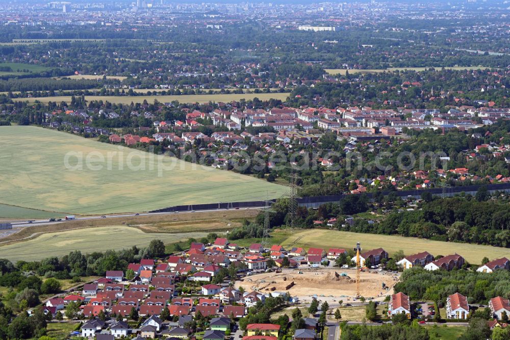 Schwanebeck from the bird's eye view: Construction site to build a new multi-family residential complex Am Eichenring in Schwanebeck in the state Brandenburg, Germany