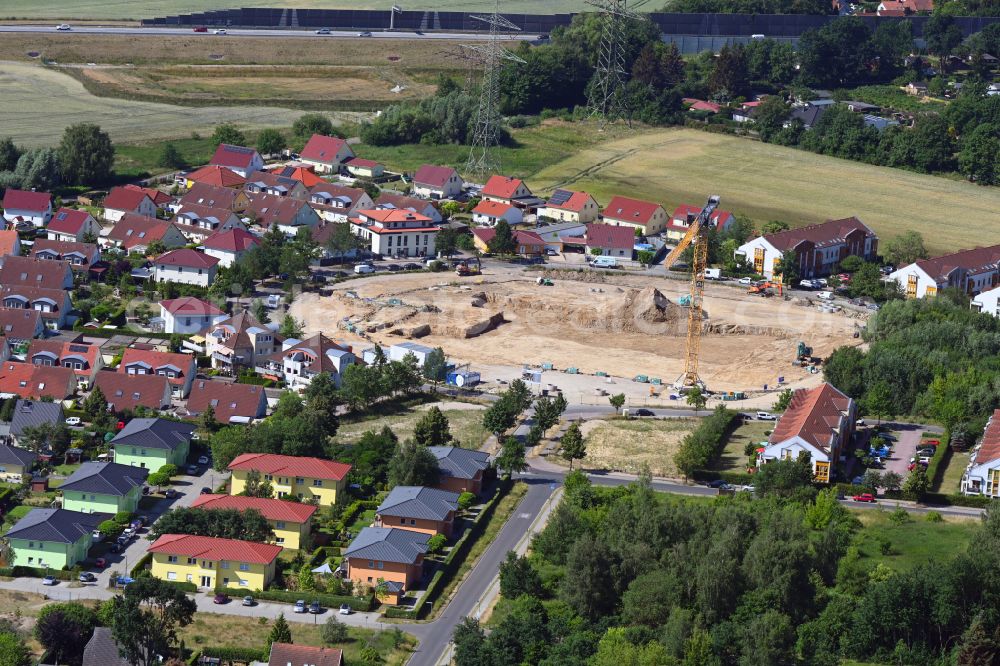 Aerial photograph Schwanebeck - Construction site to build a new multi-family residential complex Am Eichenring in Schwanebeck in the state Brandenburg, Germany