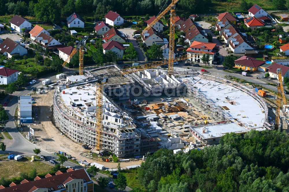 Schwanebeck from the bird's eye view: Construction site to build a new multi-family residential complex Am Eichenring in Schwanebeck in the state Brandenburg, Germany