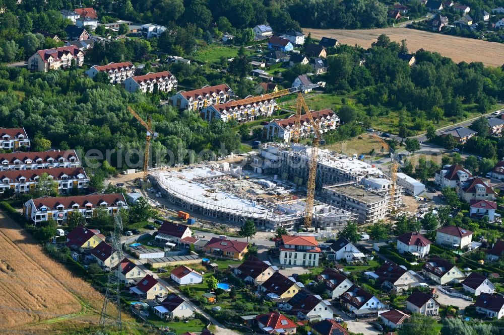 Schwanebeck from the bird's eye view: Construction site to build a new multi-family residential complex Am Eichenring in Schwanebeck in the state Brandenburg, Germany