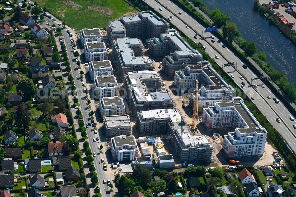 Aerial image Berlin - Construction site to build a new multi-family residential complex on Eisenhutweg in the district Johannisthal in Berlin, Germany