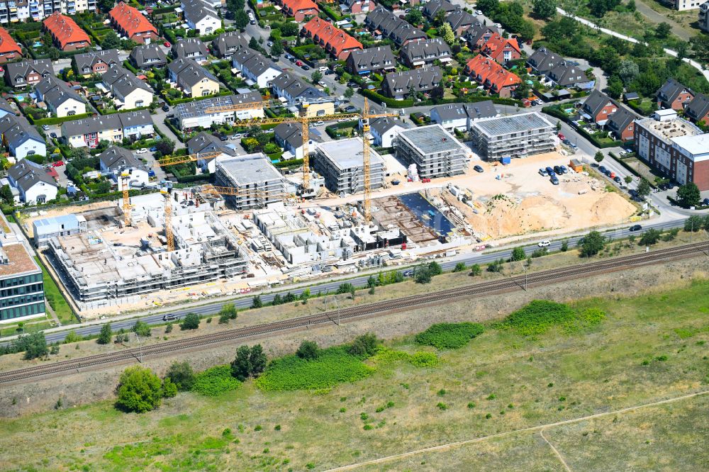 Falkensee from above - Construction site to build a new multi-family residential complex on street Seegefelder Strasse in Falkensee in the state Brandenburg, Germany