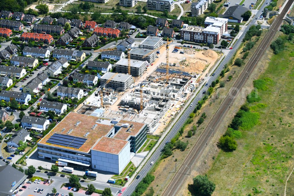 Aerial image Falkensee - Construction site to build a new multi-family residential complex on street Seegefelder Strasse in Falkensee in the state Brandenburg, Germany