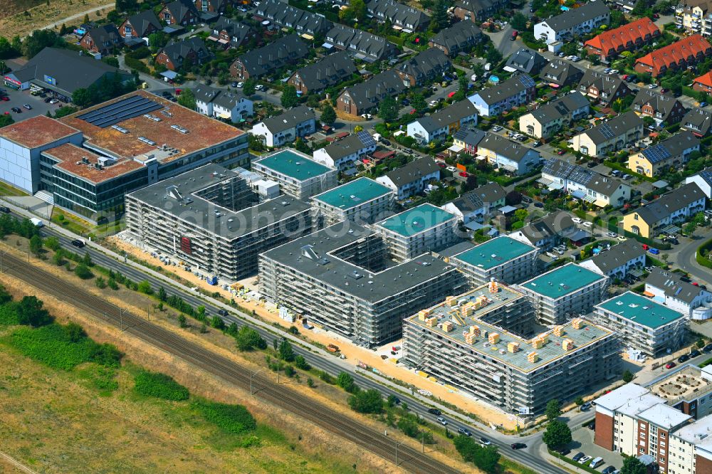 Aerial image Falkensee - Construction site to build a new multi-family residential complex on street Seegefelder Strasse in Falkensee in the state Brandenburg, Germany