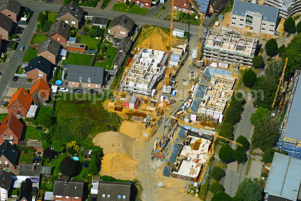 Aerial photograph Borken - Construction site to build a new multi-family residential complex Hawerkaempen Quartier on street Auf der Fluet - Hawerkaempe in Borken in the state North Rhine-Westphalia, Germany