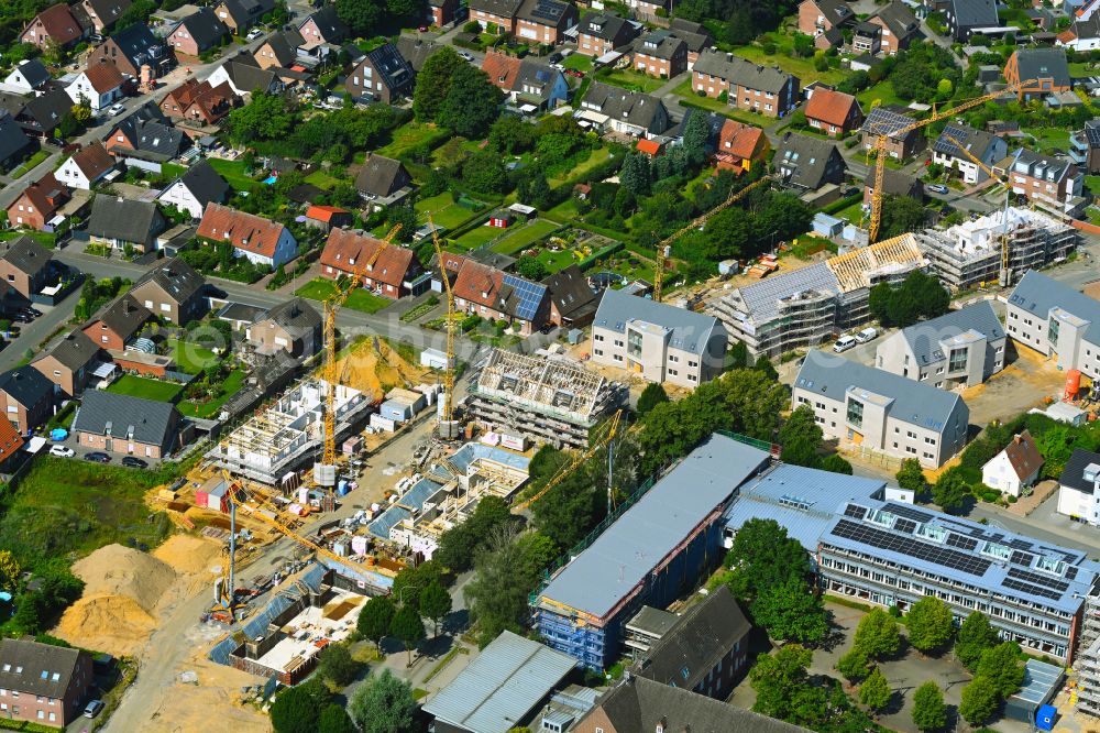 Borken from the bird's eye view: Construction site to build a new multi-family residential complex Hawerkaempen Quartier on street Auf der Fluet - Hawerkaempe in Borken in the state North Rhine-Westphalia, Germany