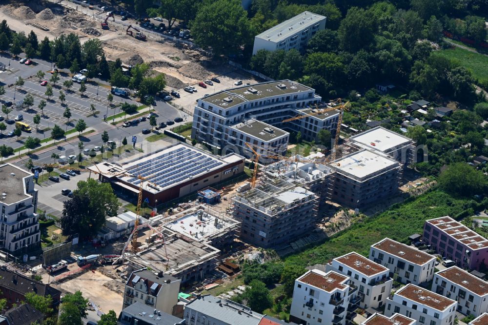 Berlin from above - Construction site to build a new multi-family residential complex of HoWoGe on street Lueckstrasse in the district Rummelsburg in Berlin, Germany