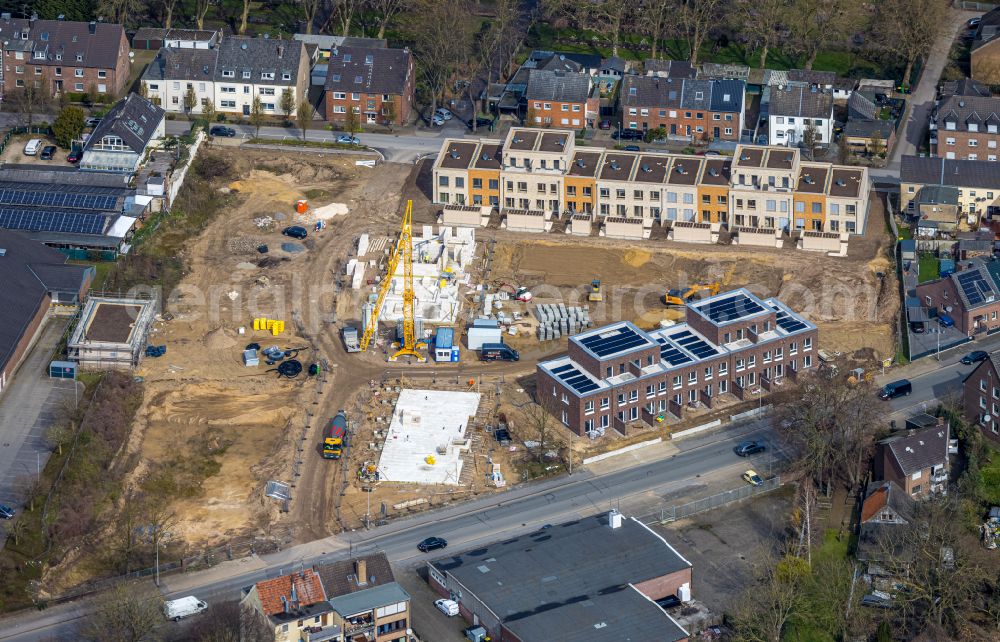 Emmerich am Rhein from above - Construction site to build a new multi-family residential complex on Wassenbergstrasse - Muehlenweg on street Zur Alten Taufabrik in Emmerich am Rhein in the state North Rhine-Westphalia, Germany