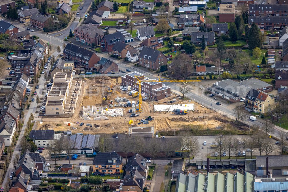 Emmerich am Rhein from above - Construction site to build a new multi-family residential complex on Wassenbergstrasse - Muehlenweg on street Zur Alten Taufabrik in Emmerich am Rhein in the state North Rhine-Westphalia, Germany