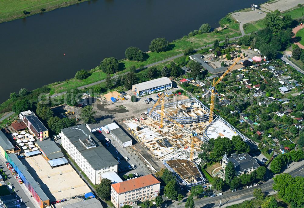 Dresden from the bird's eye view: Construction site to build a new multi-family residential complex Marina Garden on place Alexander-Puschkin-Platz in Dresden in the state Saxony, Germany